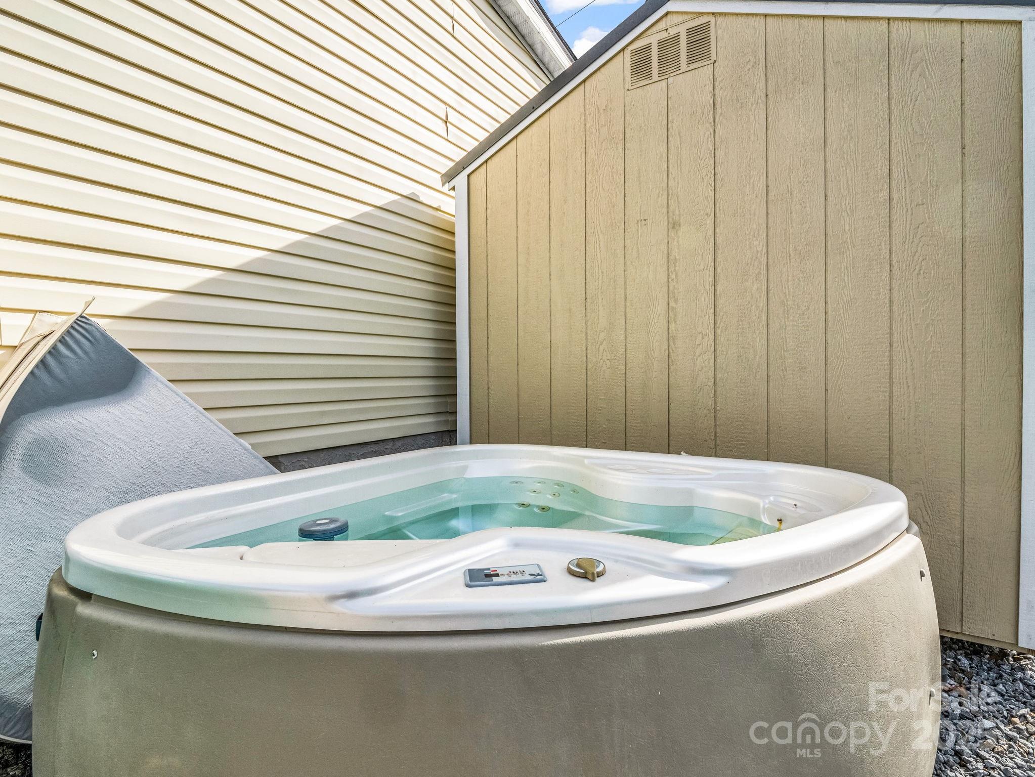 106 Hazy Day Swannanoa, NC 28778 - Photo 21 of 30 a bath tub sitting in a bathroom