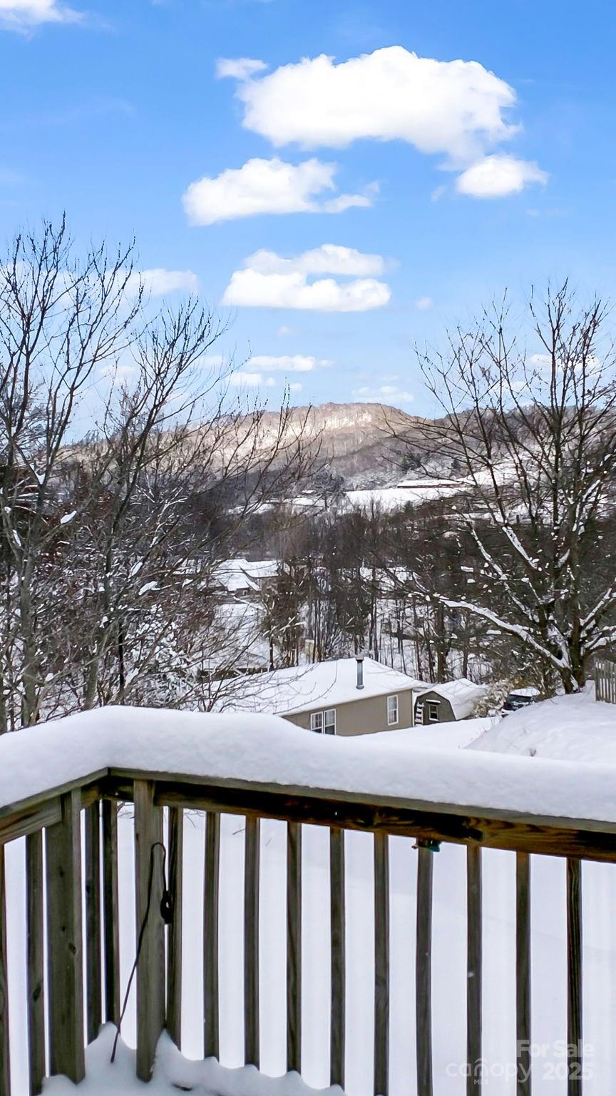 106 Hazy Day Swannanoa, NC 28778 - Photo 23 of 30 a view of a balcony with wooden fence