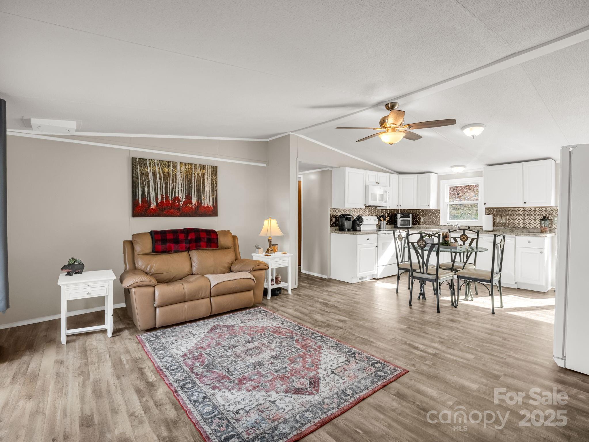 106 Hazy Day Swannanoa, NC 28778 - Photo 4 of 30 a living room with furniture and kitchen view