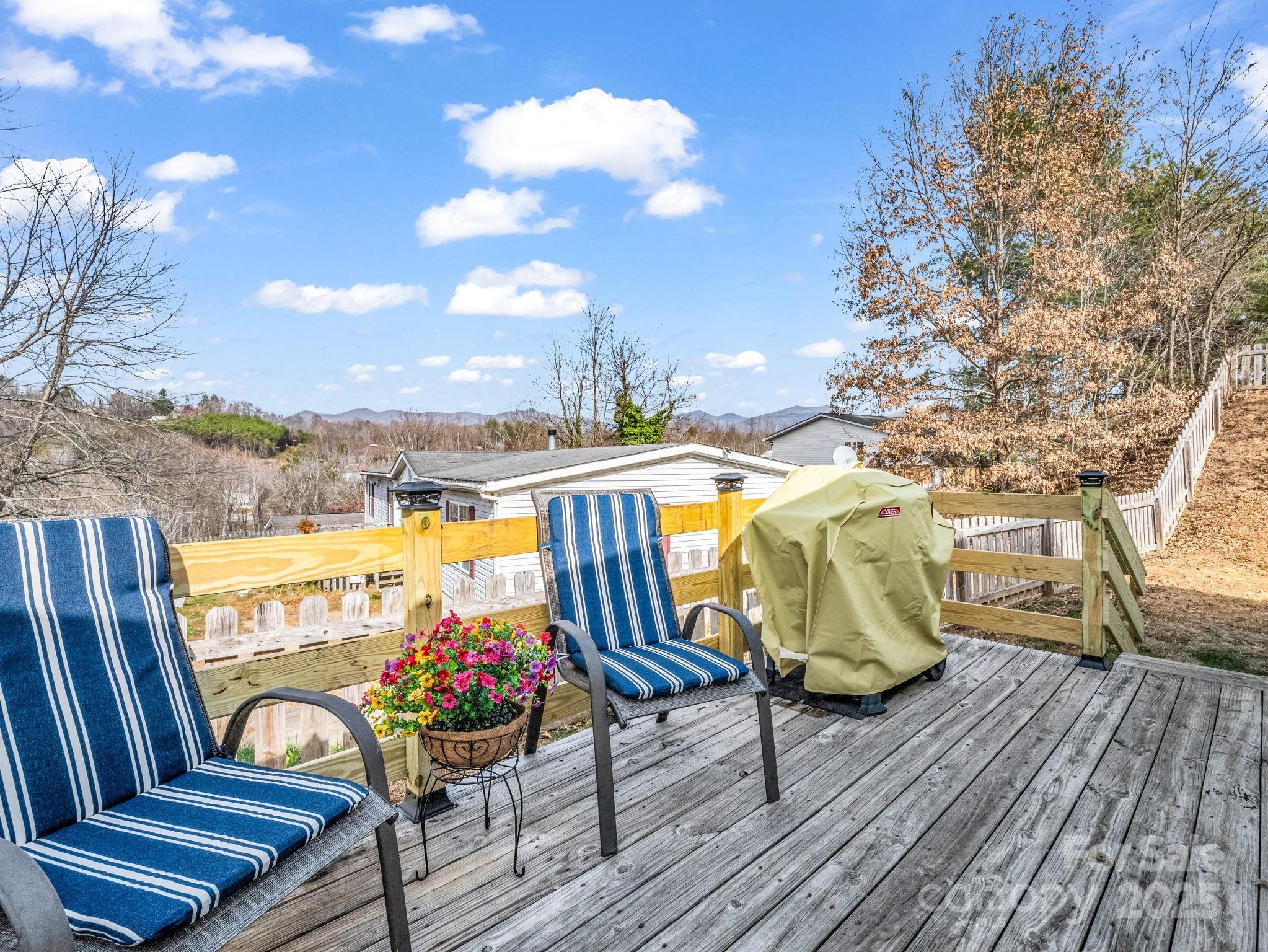 106 Hazy Day Swannanoa, NC 28778 - Photo 9 of 30 a view of a balcony with furniture and wooden floor