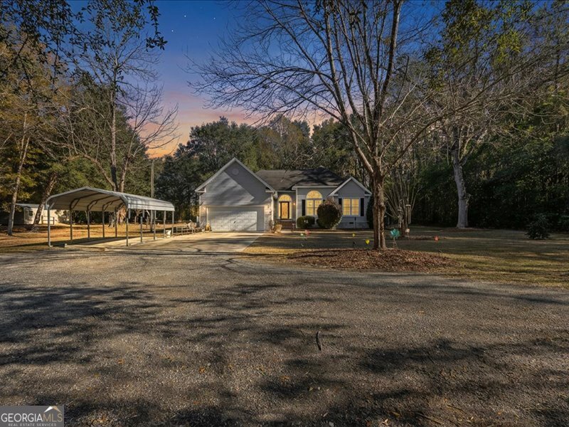 1508 Liberty Expressway Albany, GA 31705 - Photo 3 of 55 a view of house with outdoor space and trees