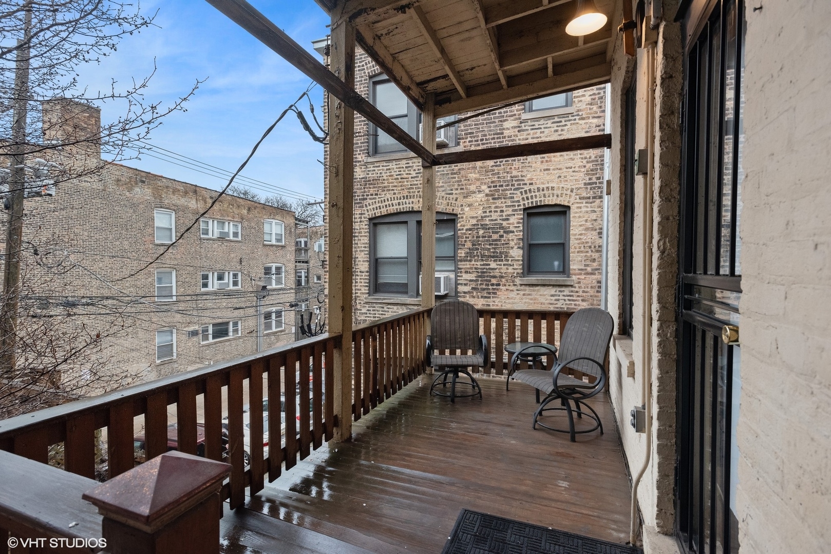 Undisclosed Address Chicago, IL 60657 - Photo 12 of 13 a view of a balcony with chairs