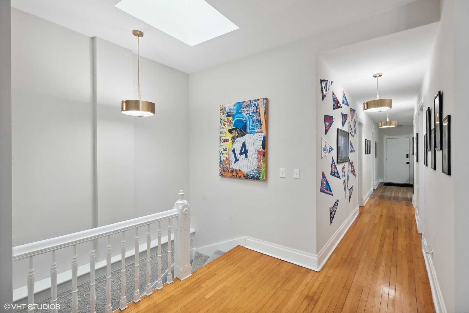 Undisclosed Address Chicago, IL 60657 - Photo 5 of 13 a view of hallway with wooden floor