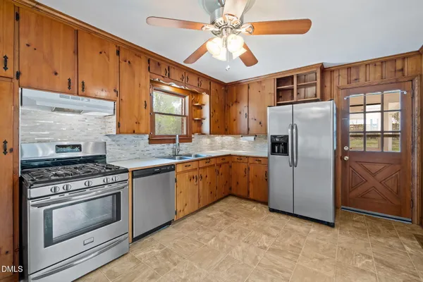 a view of a yard with an outdoor space and seating area