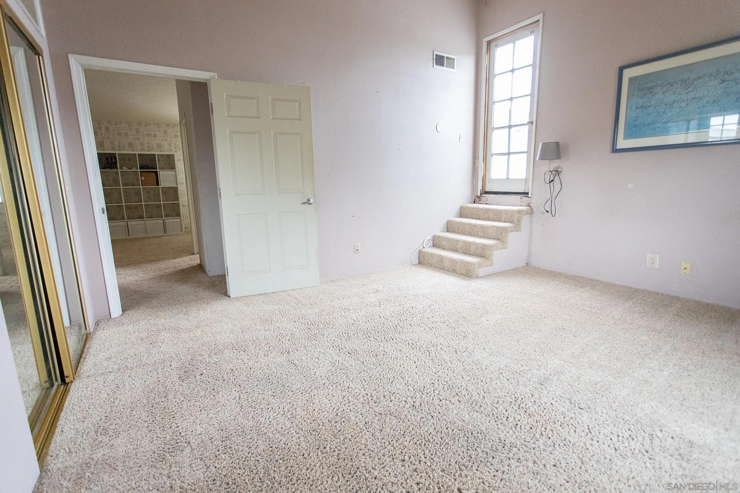 9802 Eucalyptus Street Spring Valley, CA 91977 - Photo 22 of 40 an empty room with windows