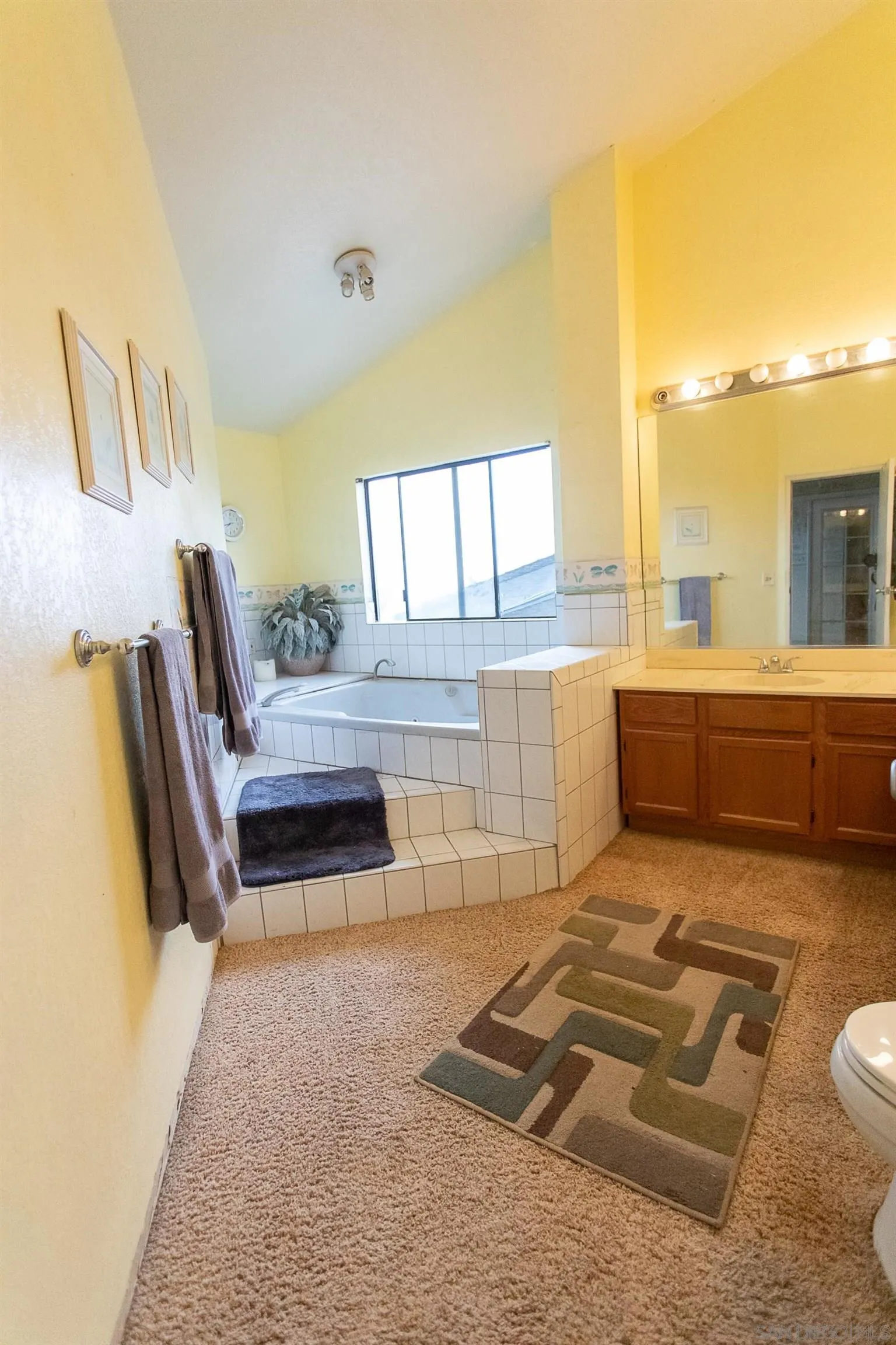 9802 Eucalyptus Street Spring Valley, CA 91977 - Photo 27 of 40 a living room with a couch and next to a window