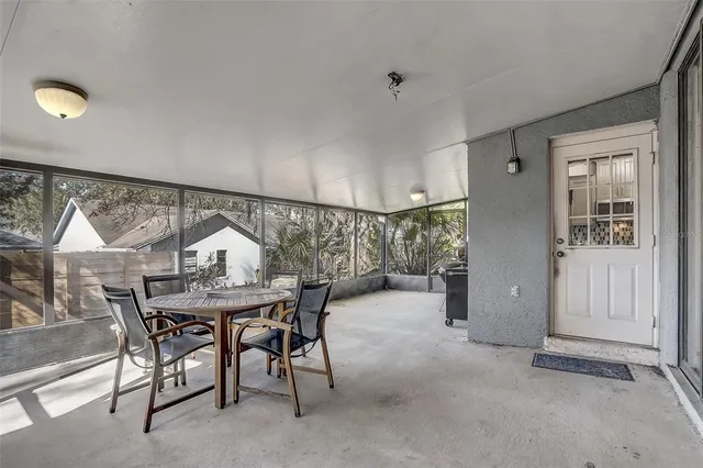 a view of a livingroom with furniture and window