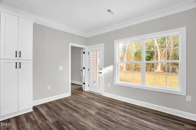 a view of kitchen with wooden floor