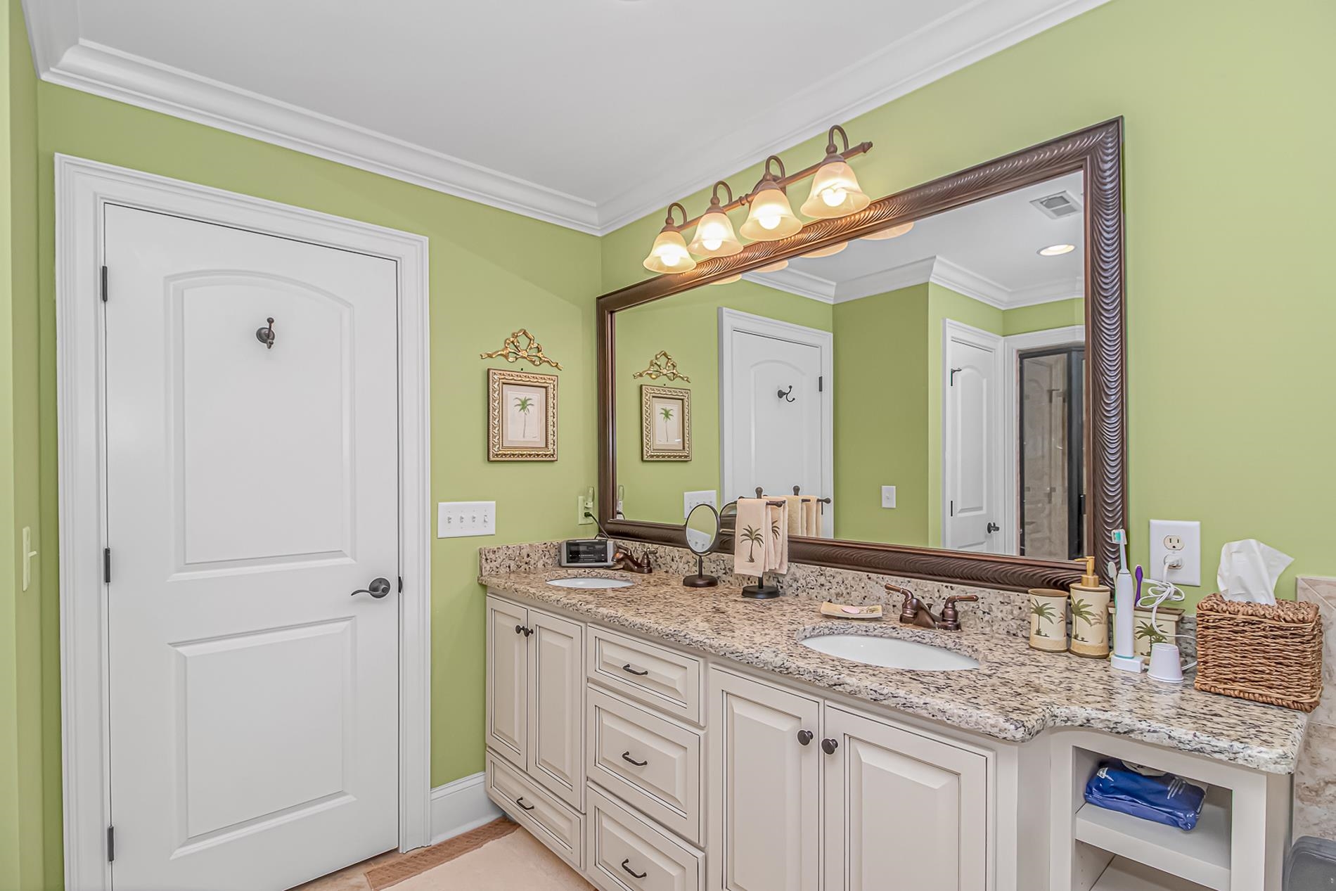 309 North Myrtle Drive Surfside Beach, SC 29575 - Photo 19 of 40 Bathroom featuring double vanity and ornamental molding