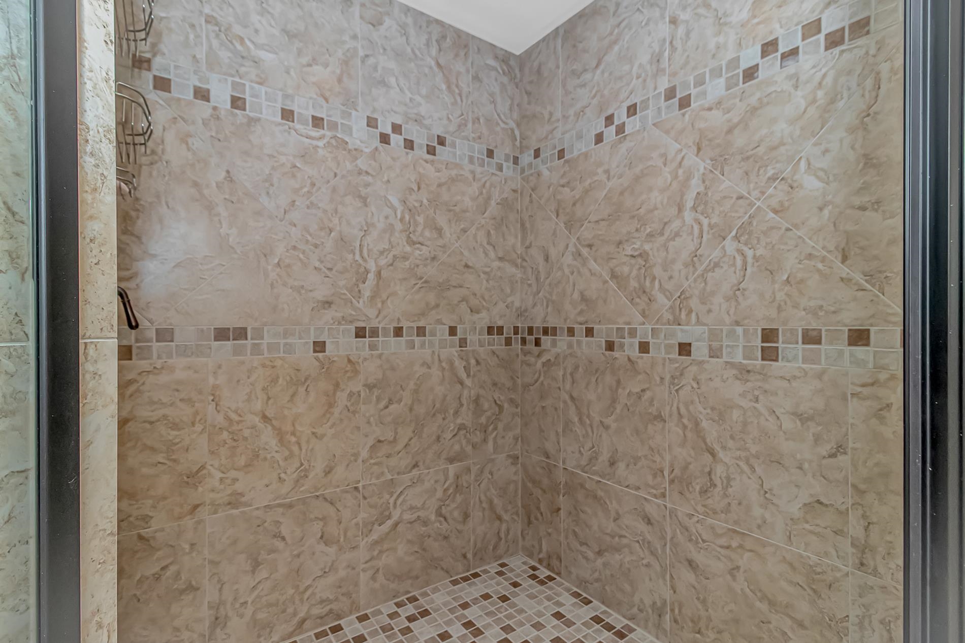 309 North Myrtle Drive Surfside Beach, SC 29575 - Photo 21 of 40 Bathroom featuring a tile shower