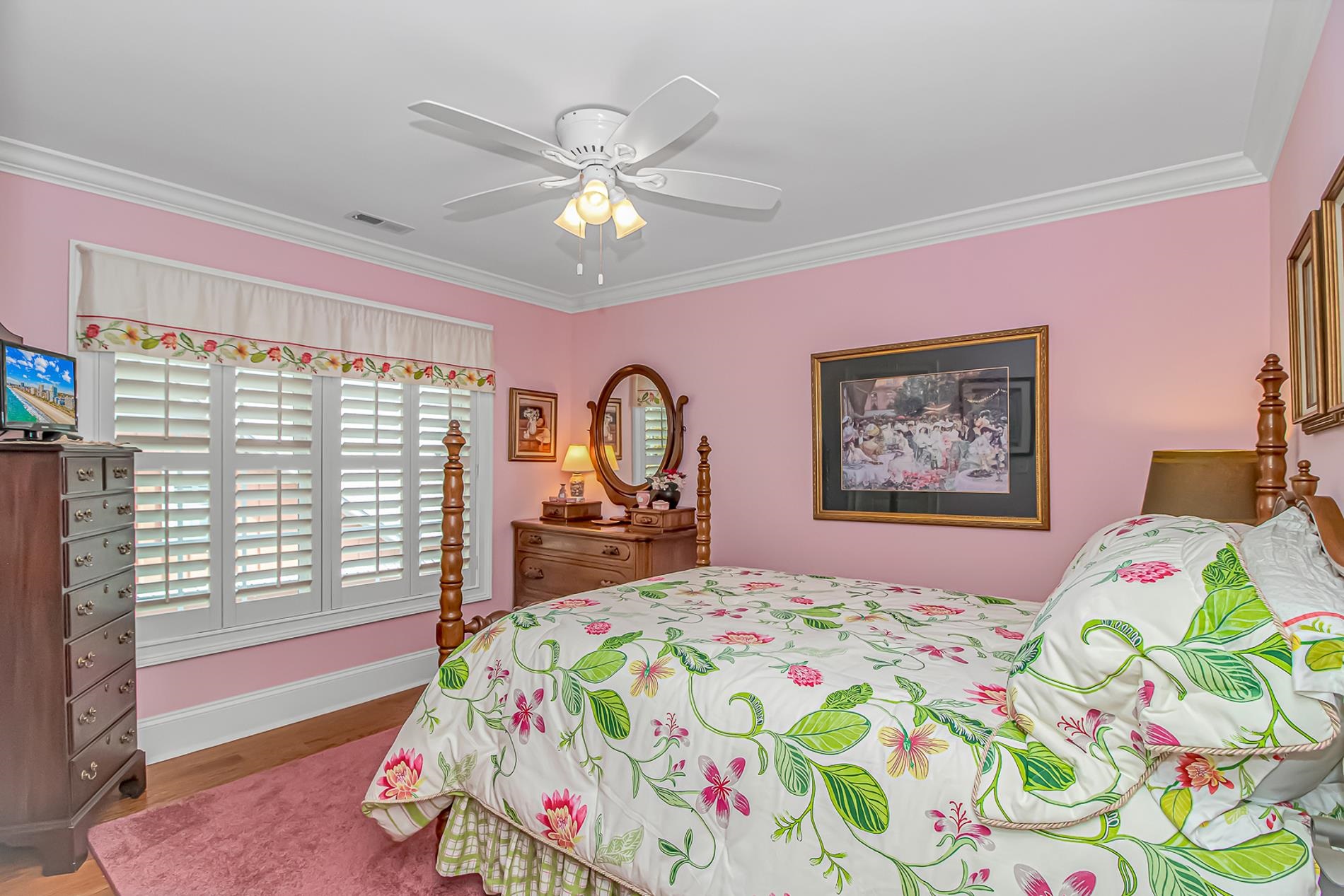 309 North Myrtle Drive Surfside Beach, SC 29575 - Photo 23 of 40 Bedroom featuring crown molding, ceiling fan, and wood finished floors