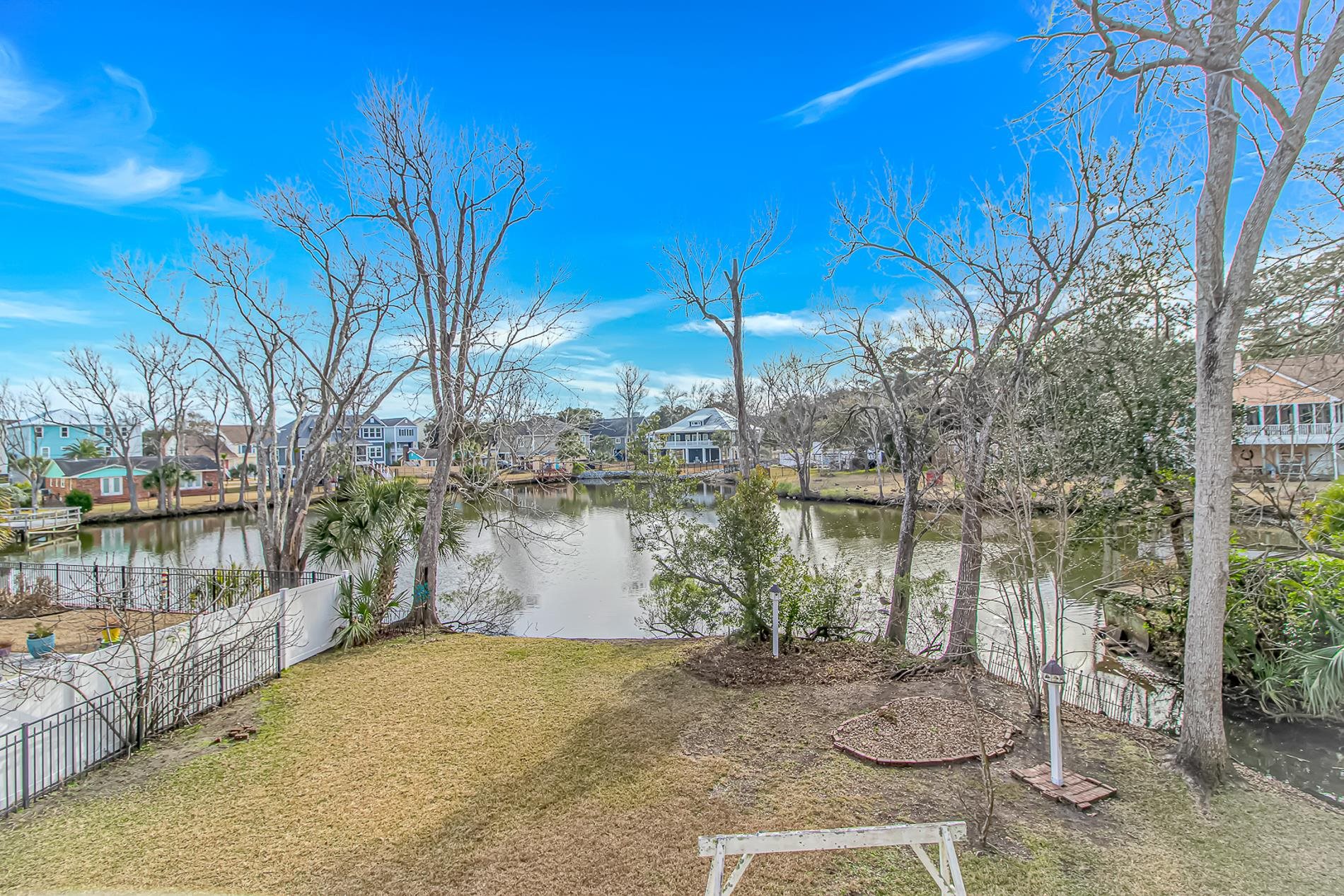 309 North Myrtle Drive Surfside Beach, SC 29575 - Photo 25 of 40 View of yard featuring a residential view and a water view