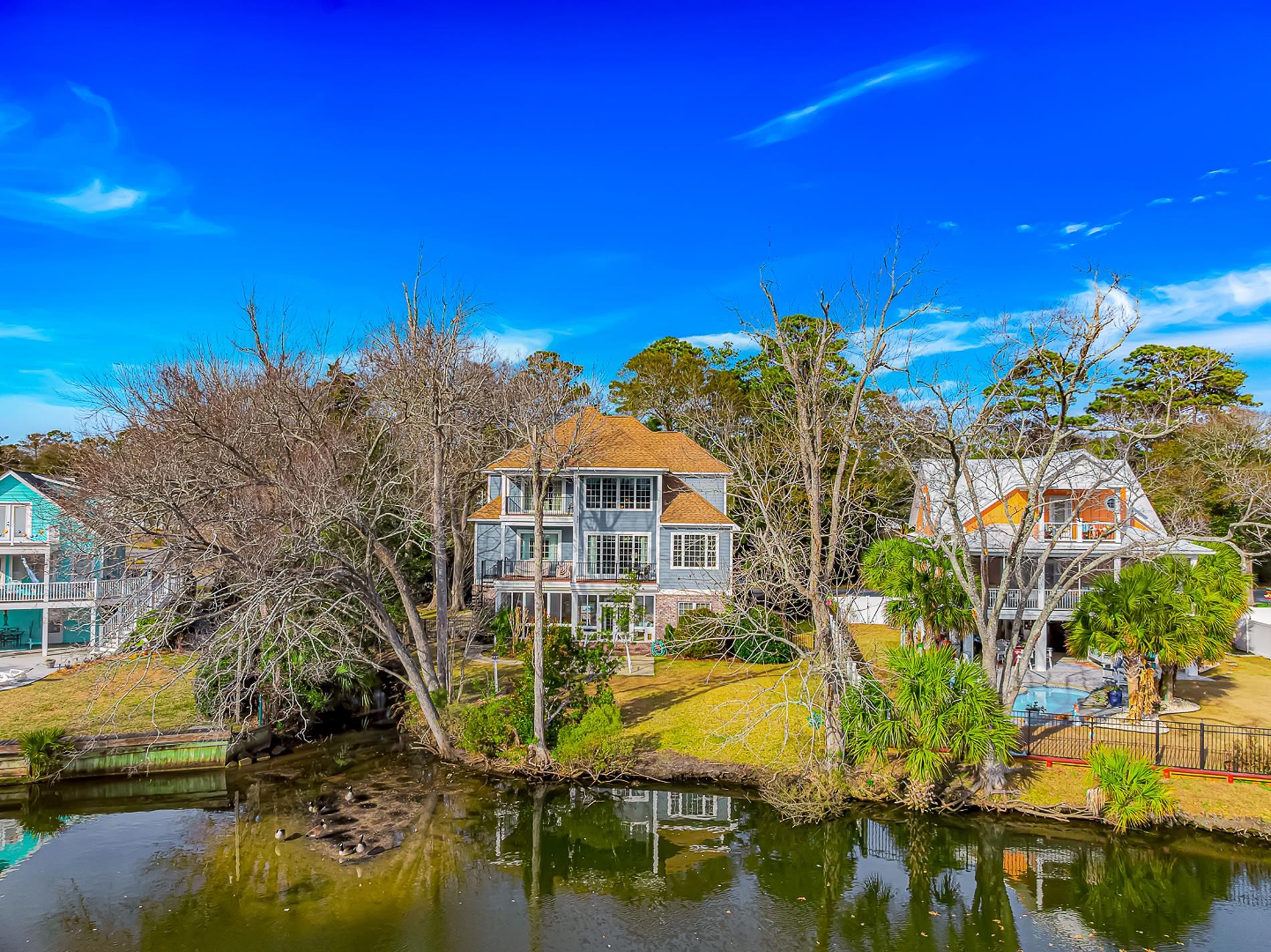 309 North Myrtle Drive Surfside Beach, SC 29575 - Photo 37 of 40 Back of house with a water view