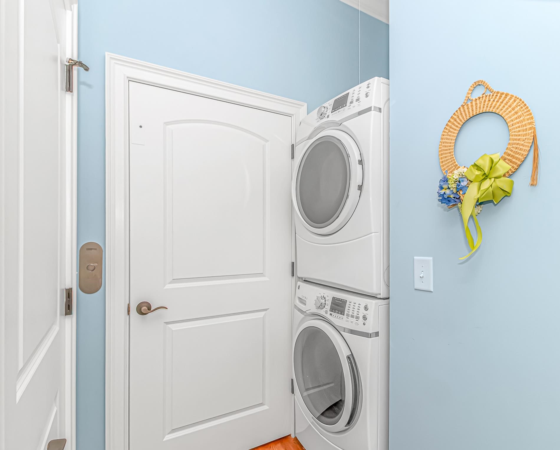 309 North Myrtle Drive Surfside Beach, SC 29575 - Photo 9 of 40 Laundry area featuring estacked washer and dryer