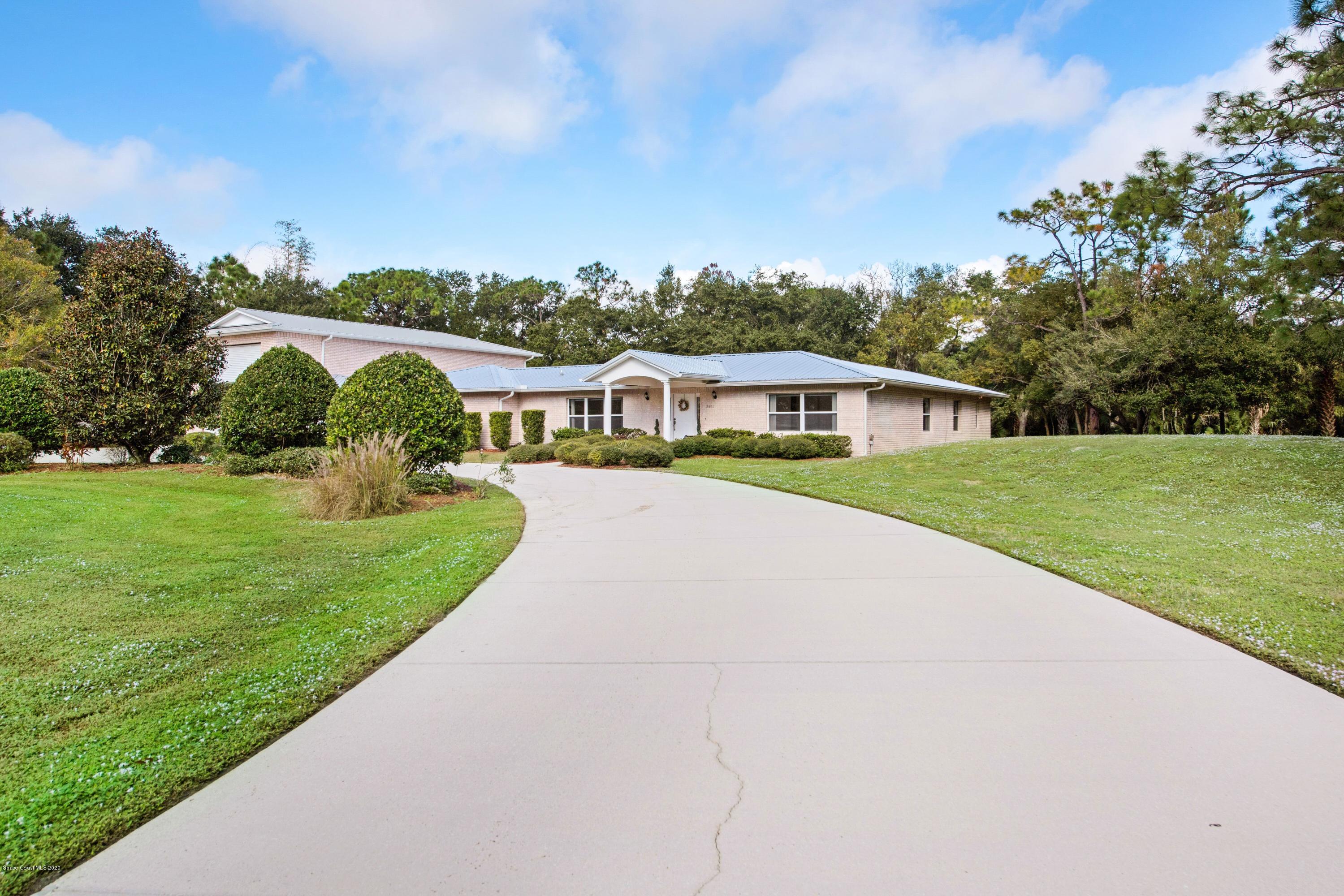 3602 Palomino Road Melbourne, FL 32934 - Photo 40 of 43 Lots of Driveway!