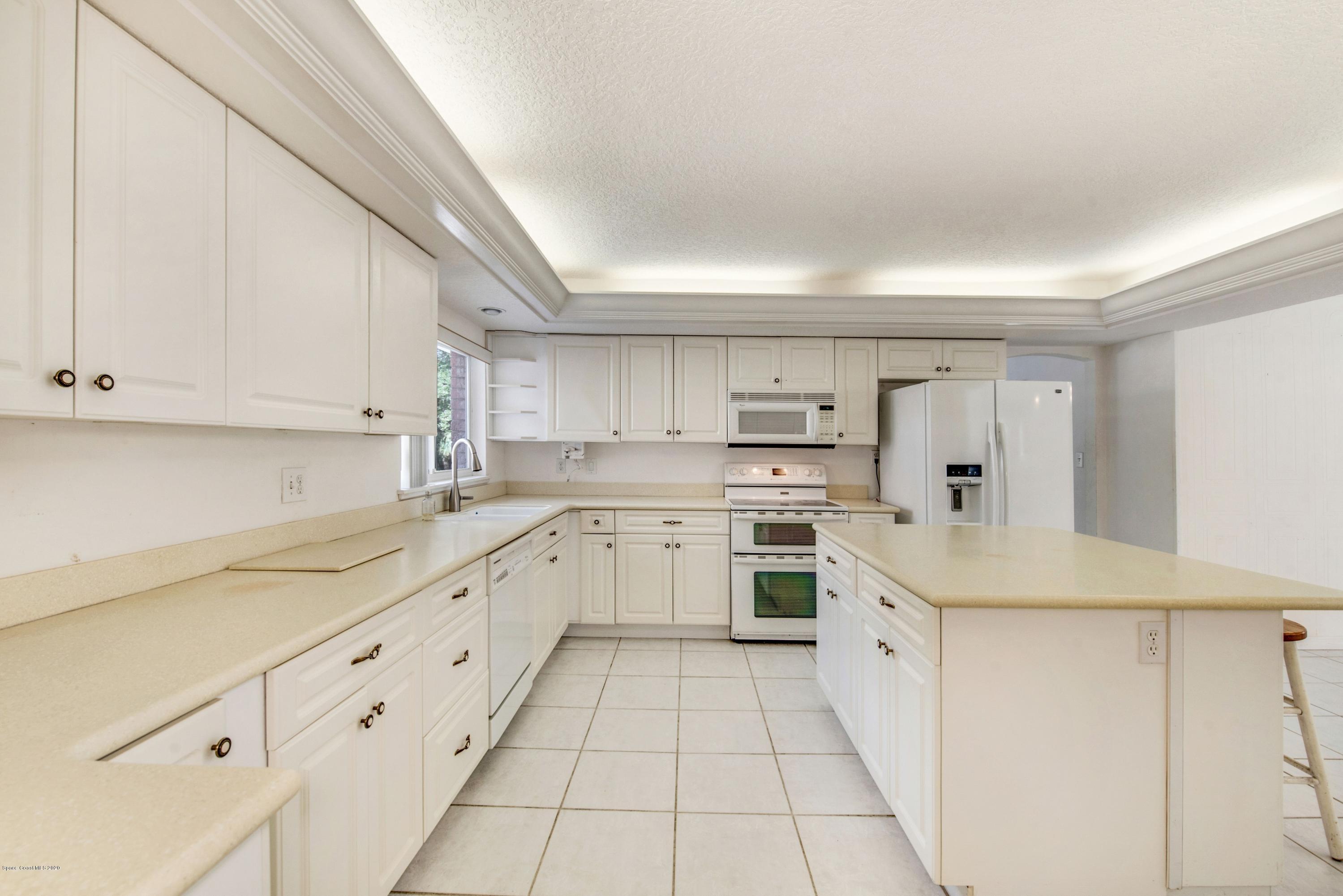 3602 Palomino Road Melbourne, FL 32934 - Photo 7 of 43 Corian Countertops & Lots of Storage!