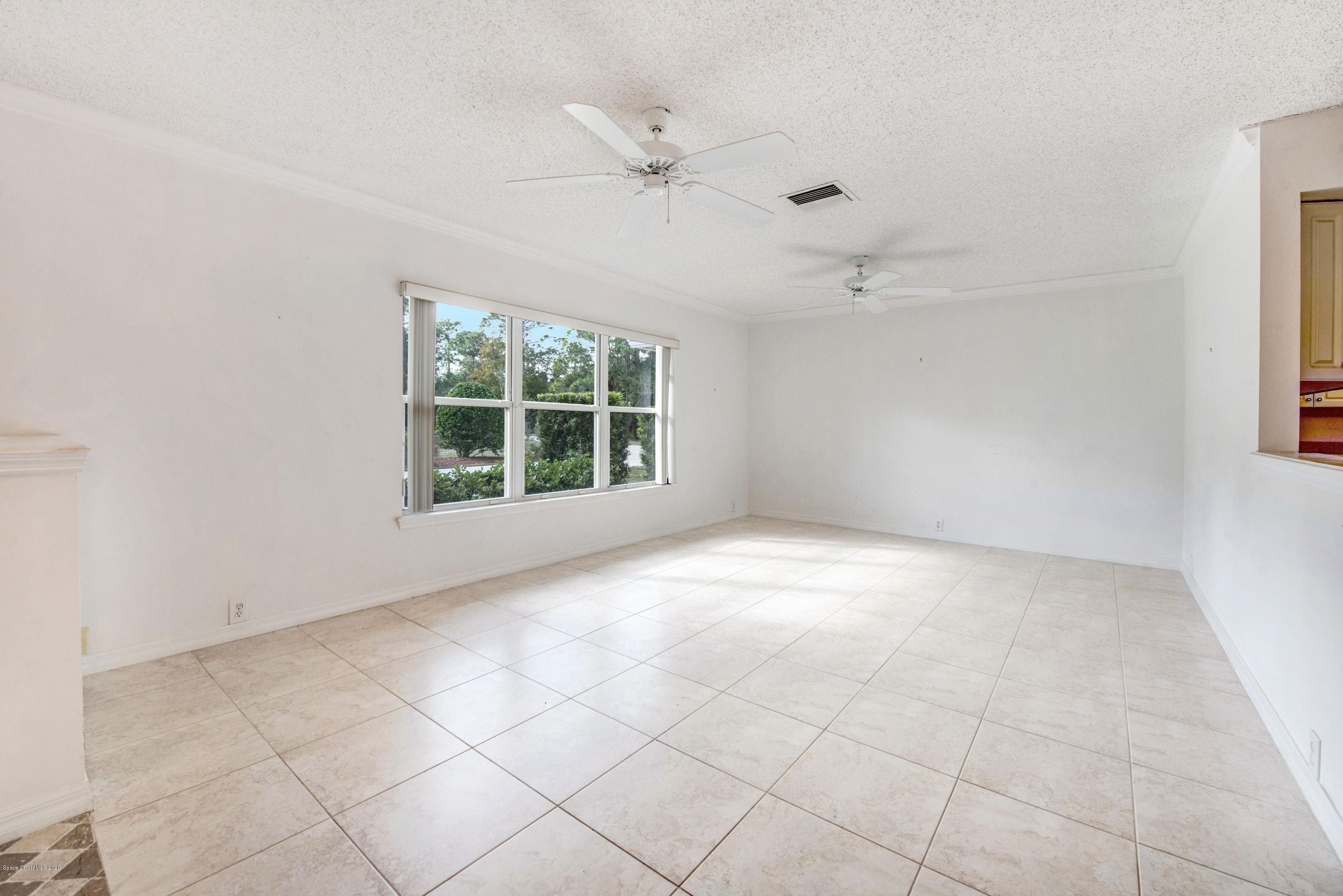 3602 Palomino Road Melbourne, FL 32934 - Photo 9 of 43 23 x 15 Living Room