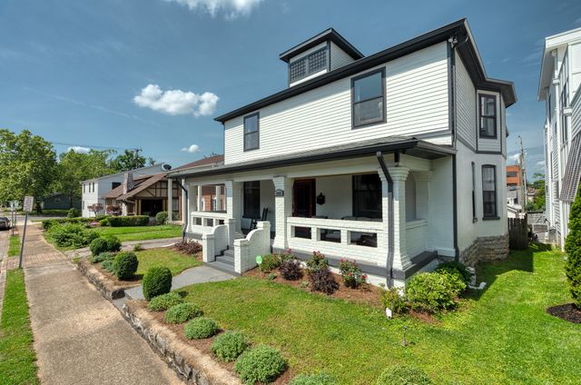 a house view with a garden space