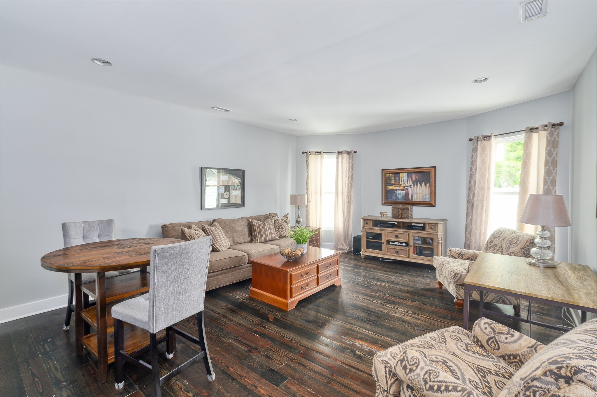 1025 Villa Place Nashville, TN 37212 - Photo 17 of 37 a living room with furniture and wooden floor