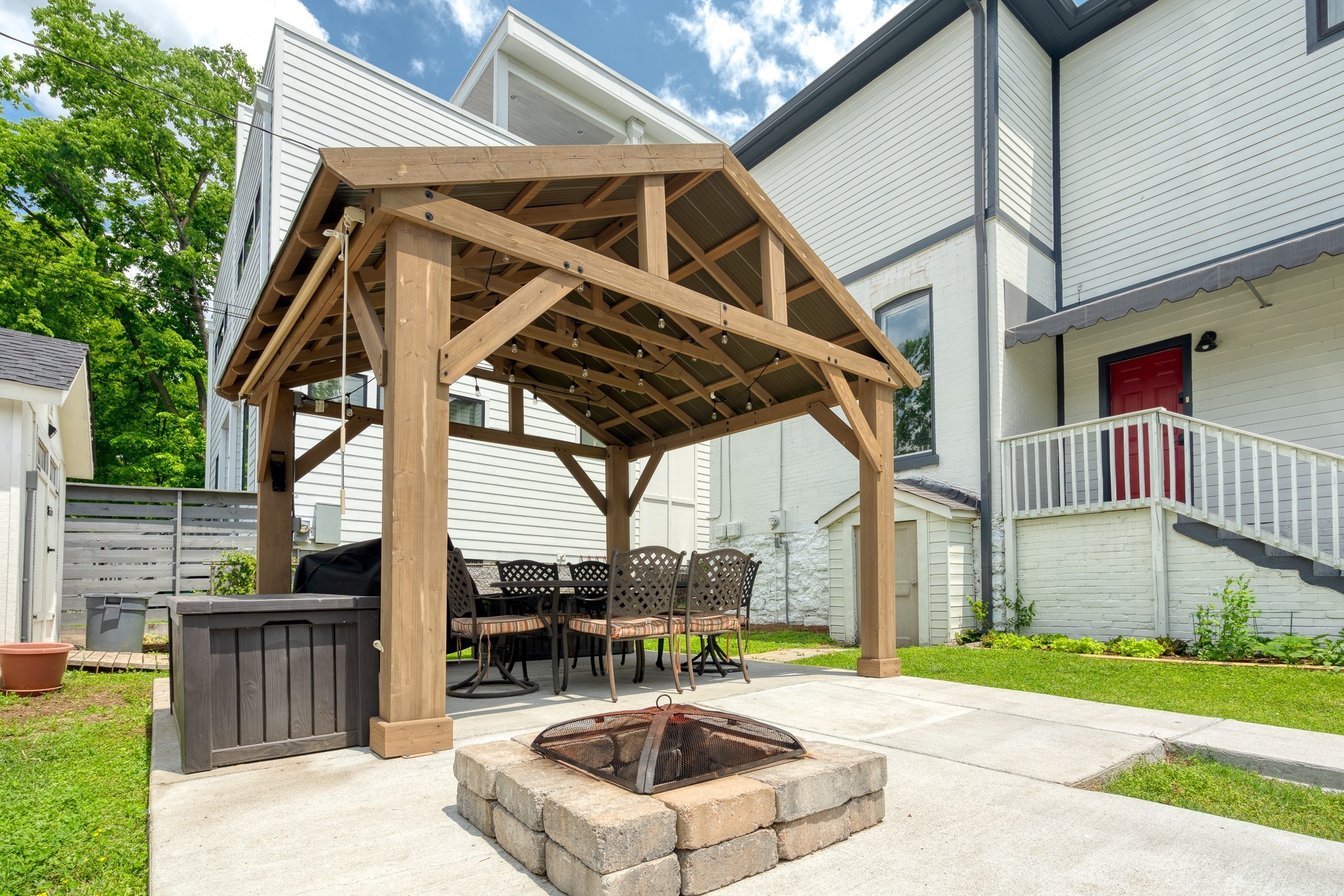 1025 Villa Place Nashville, TN 37212 - Photo 29 of 37 a view of a house with backyard and sitting area