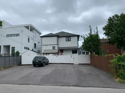 a car parked in front of a building