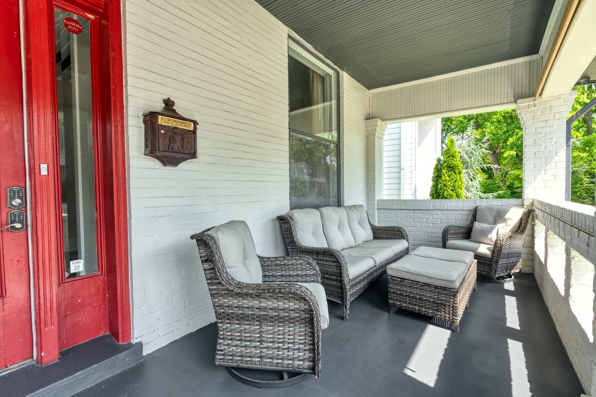 1025 Villa Place Nashville, TN 37212 - Photo 32 of 37 a outdoor living space with furniture and a flat screen tv