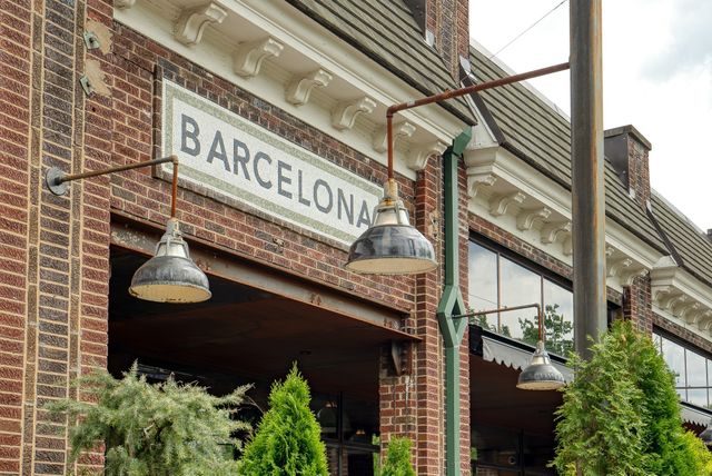 a street sign on a pole on a street