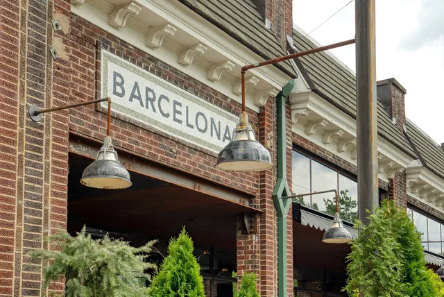a street sign on a pole on a street