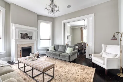 a living room with furniture or couch and a fireplace