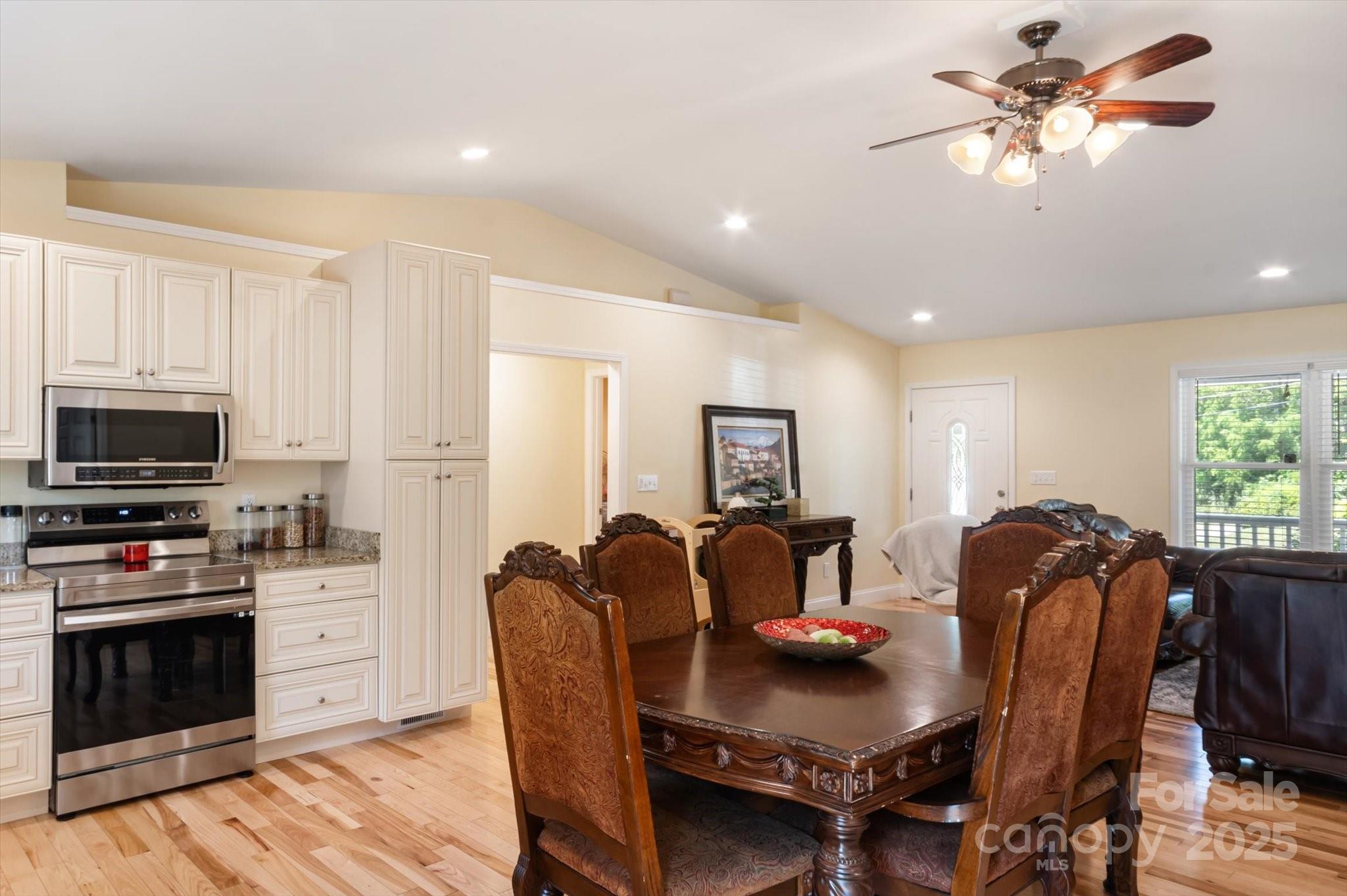 40 Alabama Avenue Marion, NC 28752 - Photo 16 of 38 a view of a dining room with furniture and a kitchen