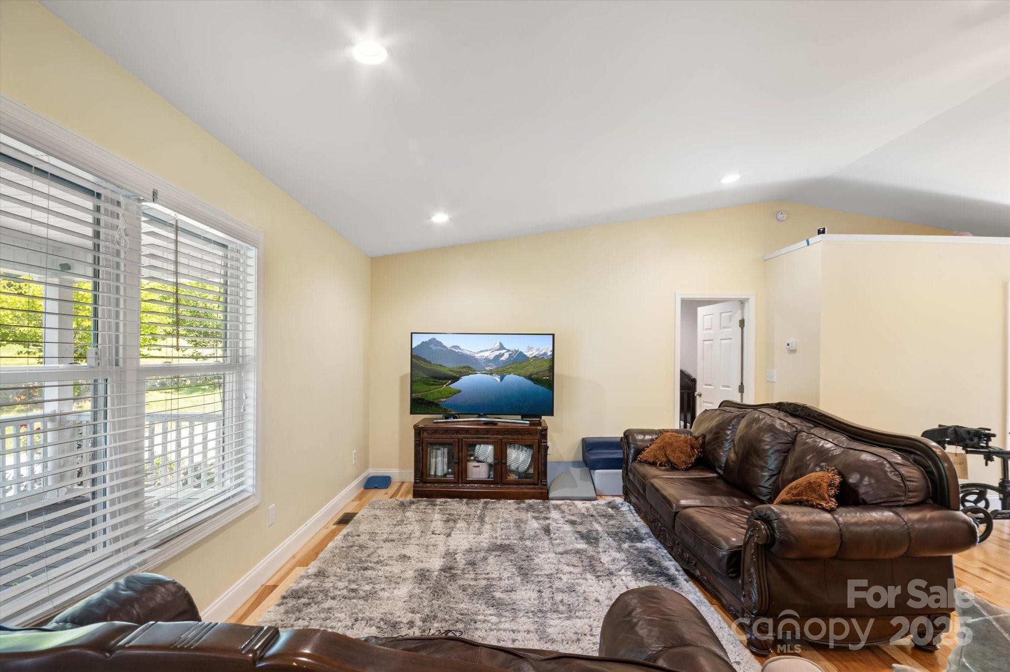 40 Alabama Avenue Marion, NC 28752 - Photo 22 of 38 a living room with furniture and a window