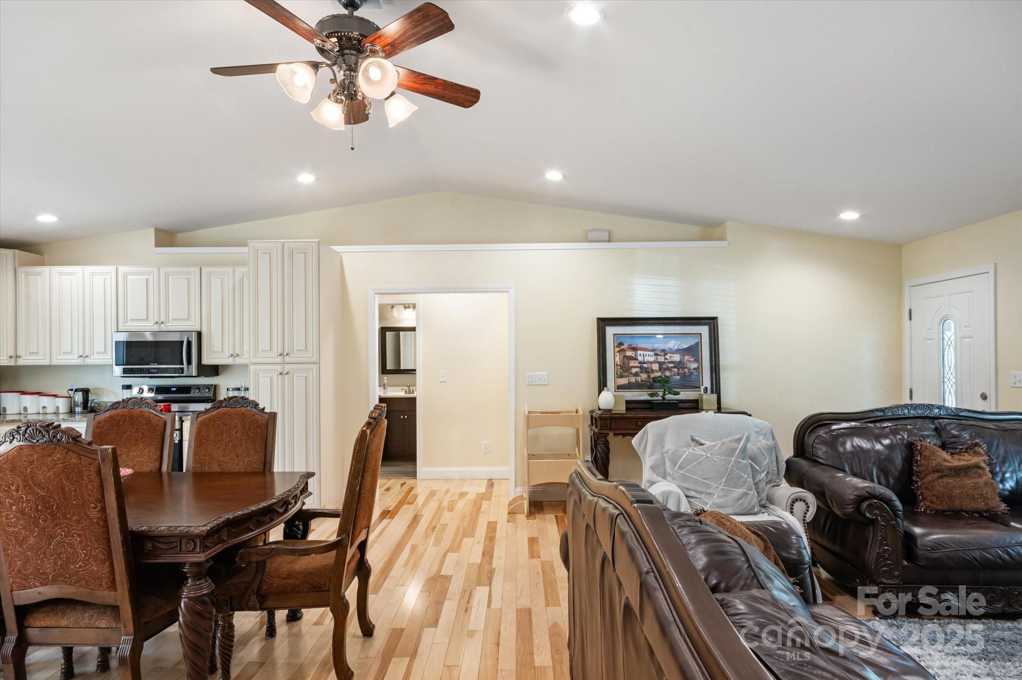 40 Alabama Avenue Marion, NC 28752 - Photo 23 of 38 a living room with furniture and a flat screen tv