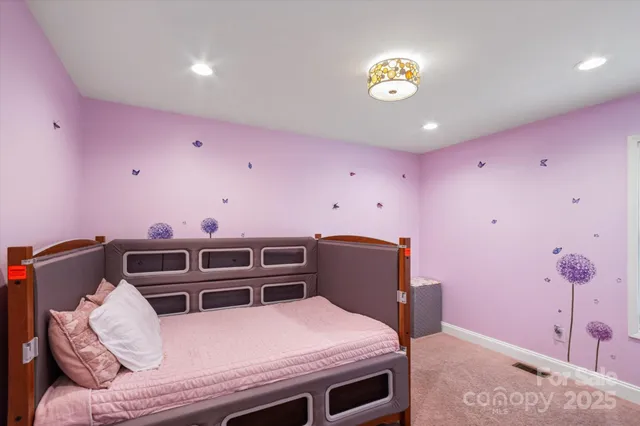 a bathroom with a shower curtain and a sink