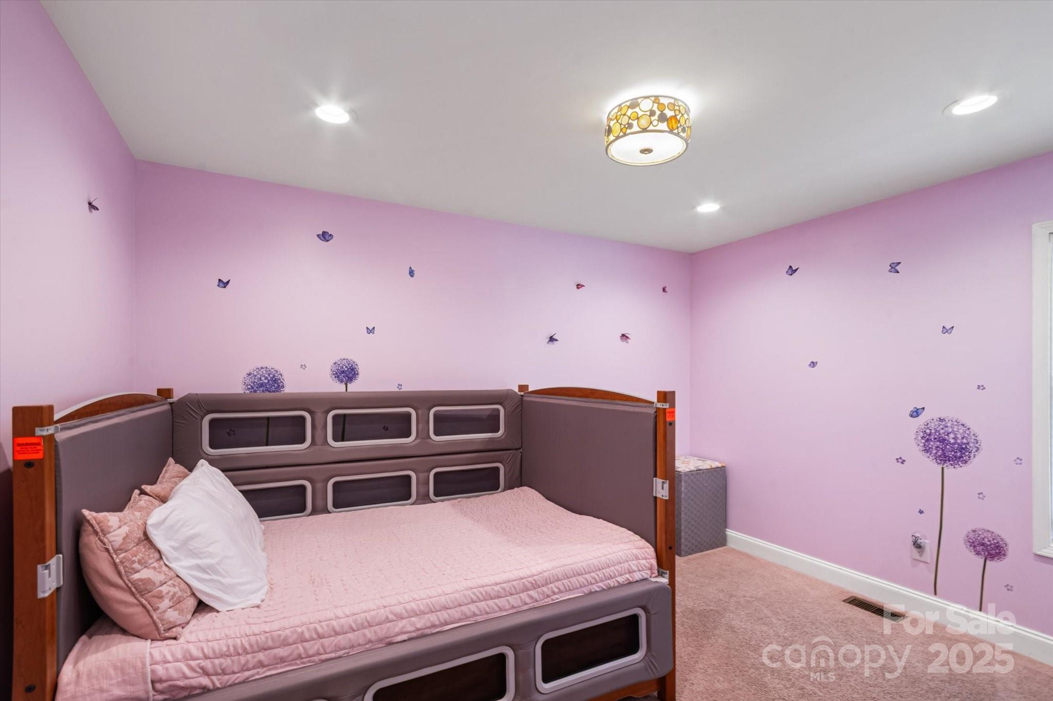 40 Alabama Avenue Marion, NC 28752 - Photo 29 of 38 a bedroom with furniture and natural light