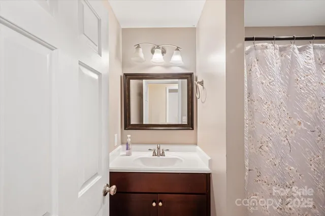 a view of a bedroom from a hallway