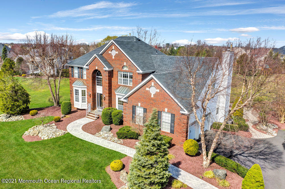 231 Pin Oak Road Freehold, NJ 07728 - Photo 4 of 74 a front view of a house with a yard