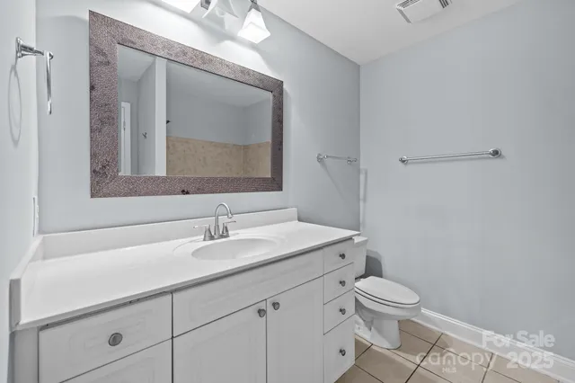 a white bath tub sitting in a bathroom