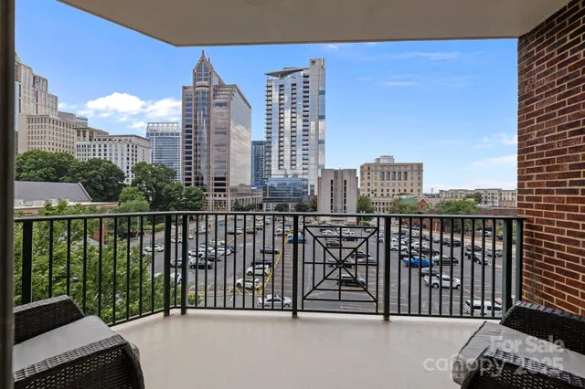 a room with lots of chairs and mirrors