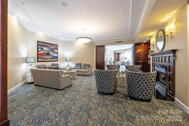 a swimming pool with buildings in background