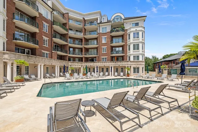 a view of balcony with furniture