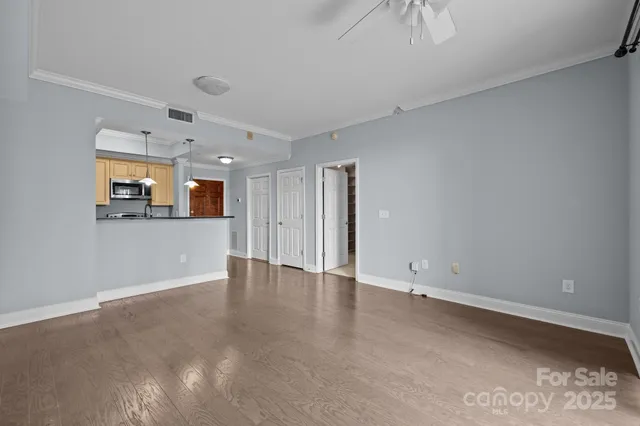 a view of a kitchen with a sink
