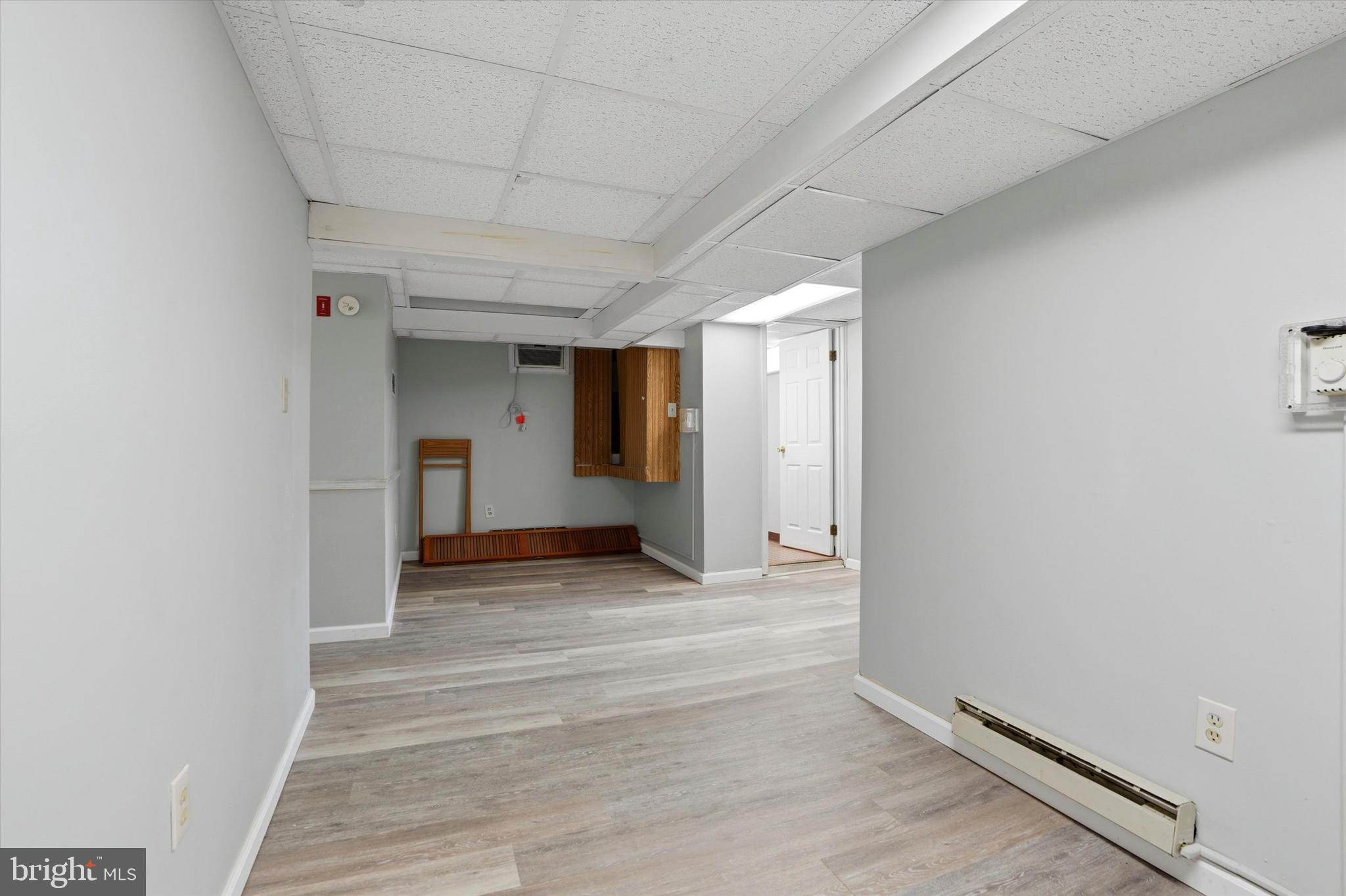 401 West Lancaster Avenue Shillington, PA 19607 - Photo 31 of 47 a view of a hallway with wooden floor and staircase
