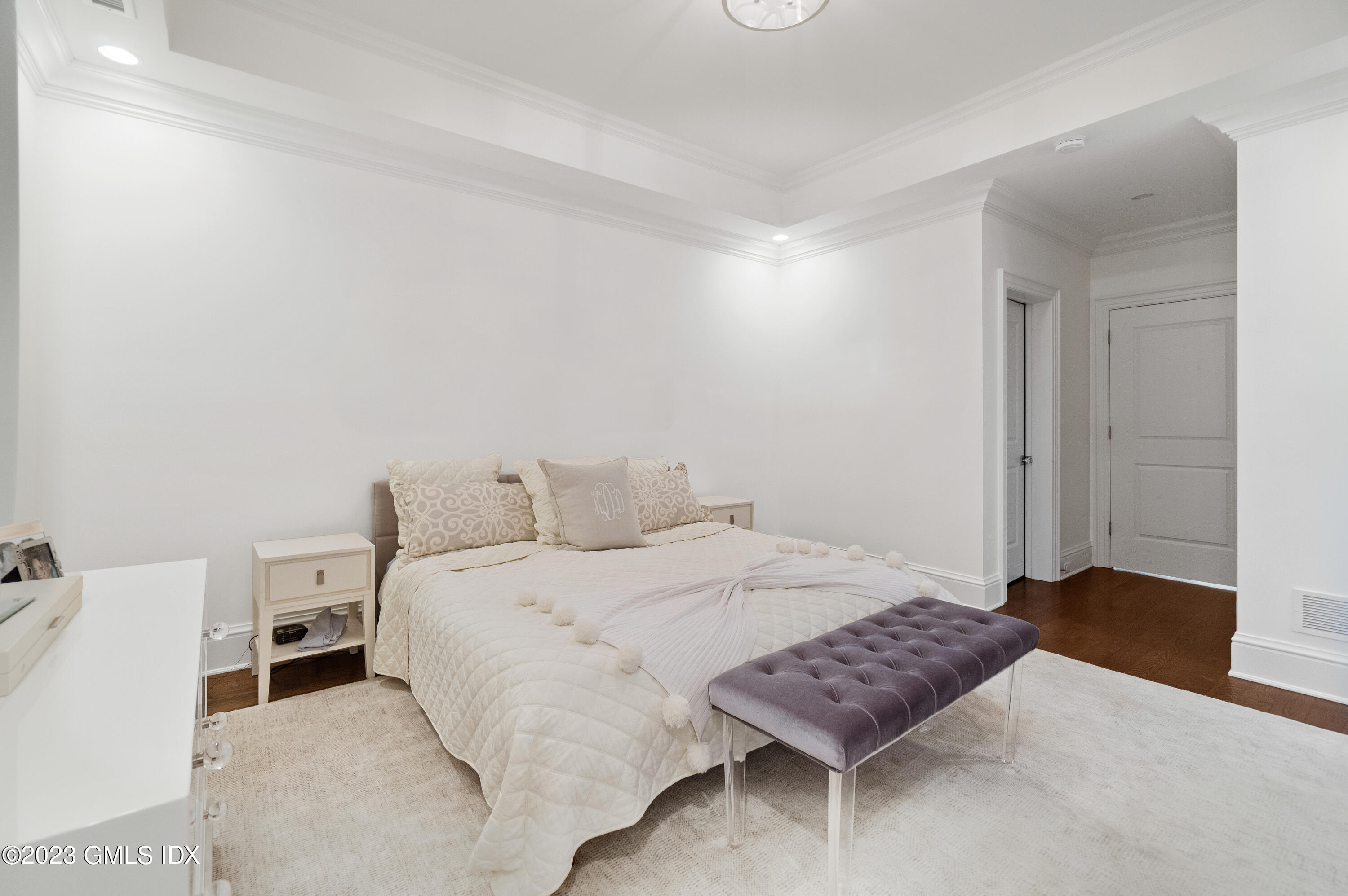 3 Orchard Place, Unit A Greenwich, CT 06830 - Photo 15 of 24 a bedroom with a bed and a closet