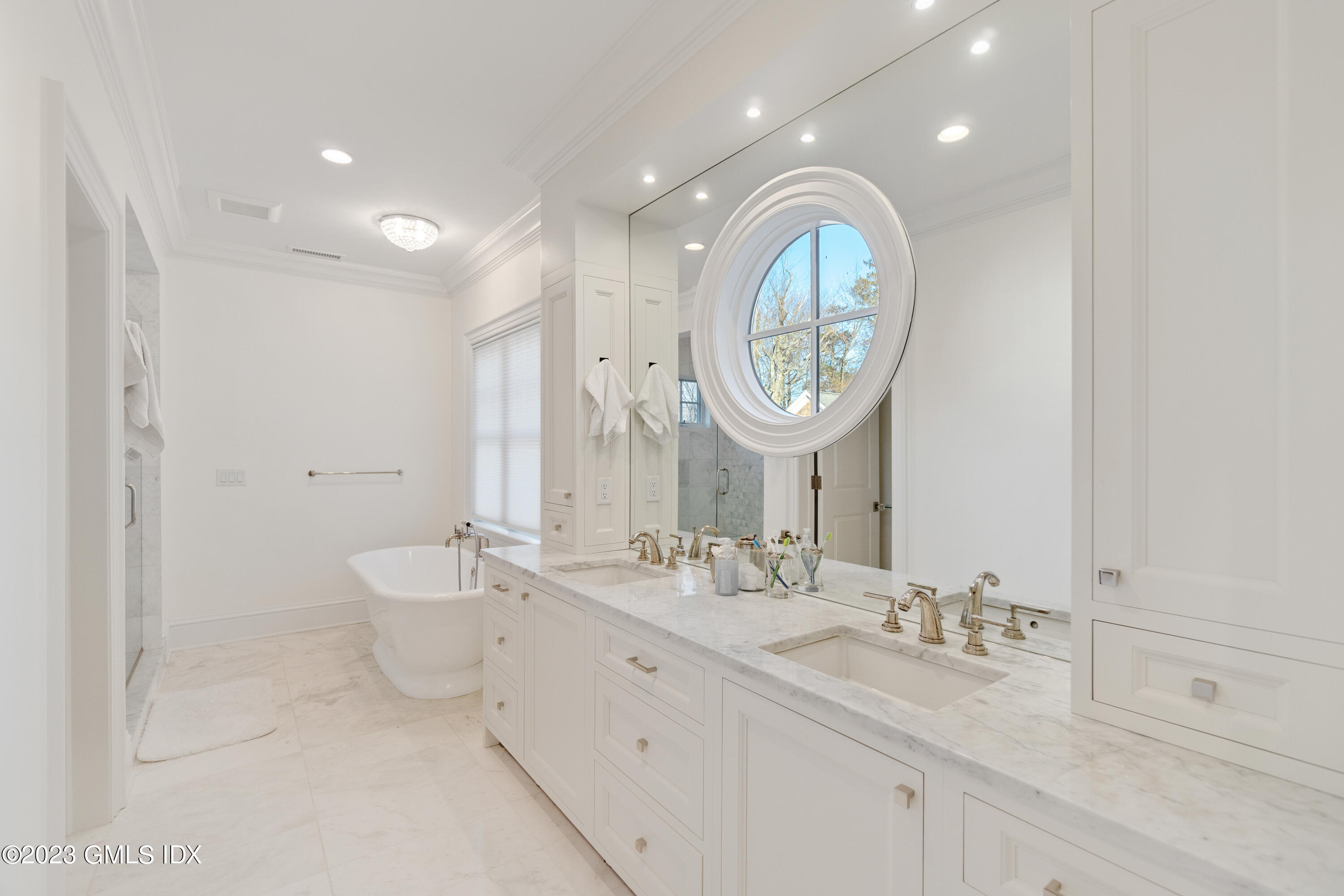 3 Orchard Place, Unit A Greenwich, CT 06830 - Photo 16 of 24 a bathroom with a toilet a sink and a mirror
