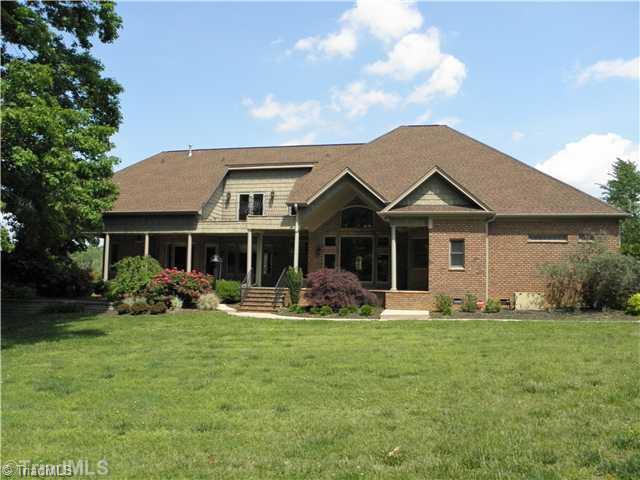 8640 Adkins Road Colfax, NC 27235 - Photo 2 of 16 Exterior Back.