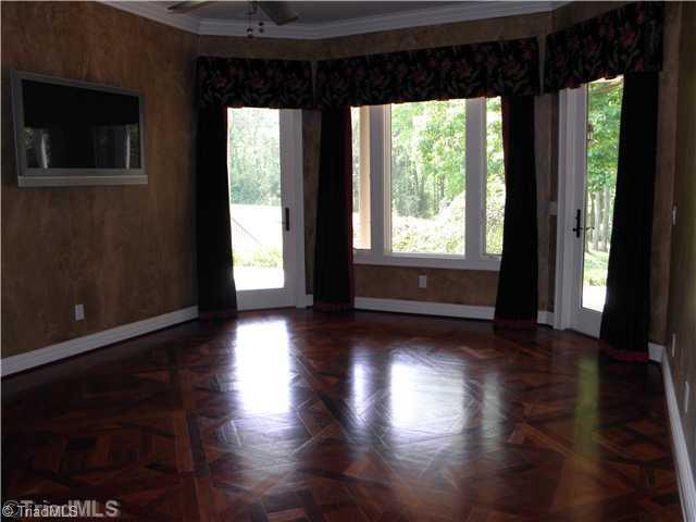 8640 Adkins Road Colfax, NC 27235 - Photo 11 of 16 Master Bedroom.