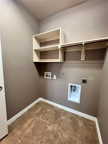 a view of a large building with a big yard