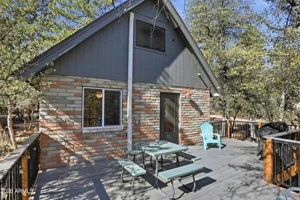 a backyard of a house with seating space