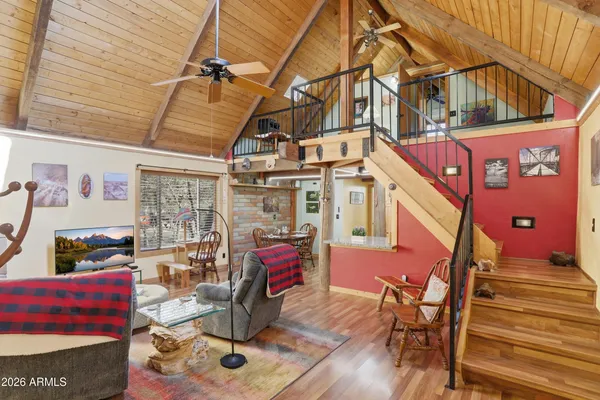 a view of a chairs with wooden floor
