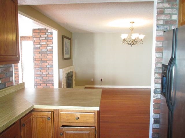 2807 Ledgetop Place Spring Valley, CA 91977 - Photo 4 of 23 looking toward the family room and breakfast nook